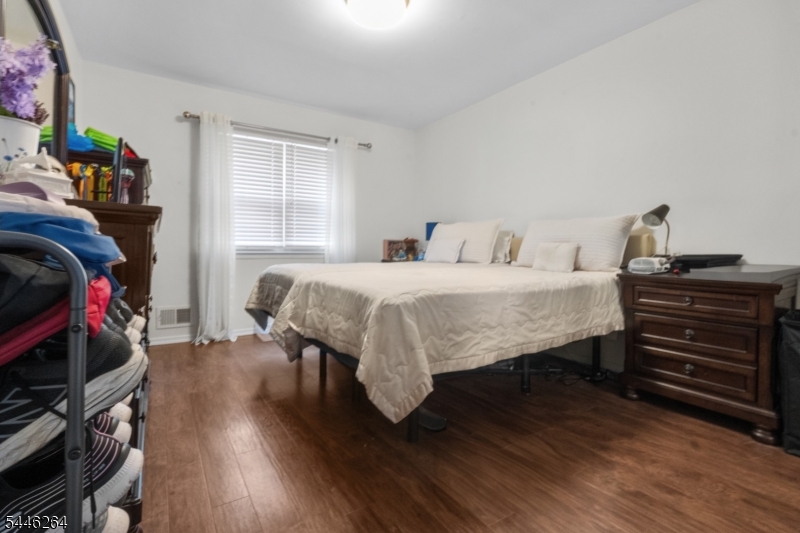 Welcome to this inviting second-floor condominium in the highly desirable Cheesequake Village, a vibrant 55+ community offering the perfect blend of comfort, convenience, and low-maintenance living ($225/Month HOA). This well-maintained home features a bright and functional layout with a spacious living room that flows seamlessly into the dining area, creating an ideal setting for both everyday living and entertaining.Just off the dining area, step onto your private deck?the perfect place to enjoy your morning coffee or unwind with peaceful views at the end of the day. The kitchen offers ample cabinet space and is conveniently positioned adjacent to the dining area, while the generously sized bedroom provides excellent closet space and comfort. An in-unit washer and dryer add everyday convenience rarely found at this price point.Residents of Cheesequake Village enjoy an exceptional lifestyle with access to a clubhouse, outdoor swimming pool, fitness room, library, game room, ballroom, bocce and horseshoe courts, and a community shuttle for local shopping and transportation. Ideally located near Cheesequake State Park, the Garden State Parkway, shopping, restaurants, and the Jersey Shore, this home offers the perfect balance of tranquility and accessibility.Whether you?re looking to downsize, simplify, or enjoy an active adult community with outstanding amenities, this move-in-ready condominium is an opportunity you won?t want to miss.