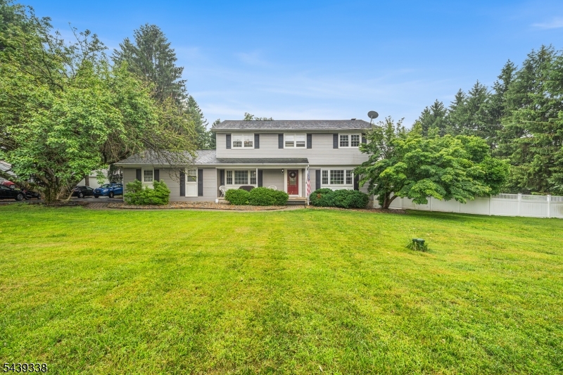 Welcome to 1 Oak Grove Road, a beautifully maintained 4-bedroom, 2.5-bath Center Hall Colonial set on a level lot in desirable Raritan Township. This spacious home offers a functional floor plan with generous living areas, abundant storage, recent bathroom updates, and a warm, inviting family room featuring a wood-burning fireplace insert.  Step outside to your private backyard retreat, highlighted by a recently updated free-form in-ground gunite pool perfect for summer entertaining and relaxation. A 2-car attached garage and mature landscaping further enhance the home's appeal.  Ideally located just minutes from the shops, restaurants, and vibrant downtown districts of Flemington and Clinton, this home provides easy access to parks, recreation, farmers markets, and major commuter routes including Routes 202, 31, and Interstate 78. Served by the highly regarded Hunterdon Central Regional High School, this property offers the perfect blend of comfort, convenience, and lifestyle in the heart of Hunterdon County.Property sold 'as-is'.