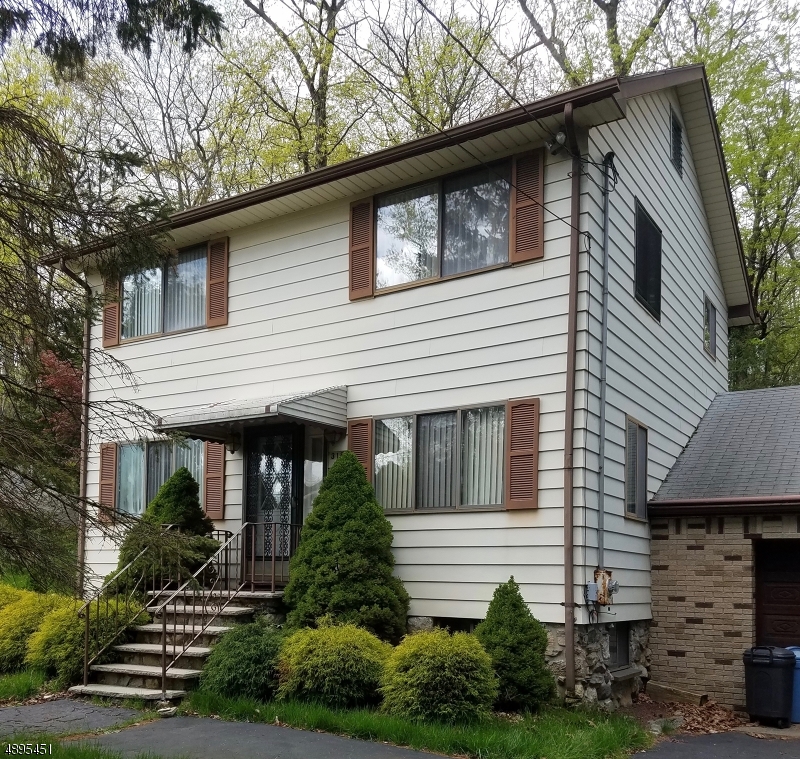 PRICE REDUCED  Why rent when you can own in the desirable community of Lake Hopatcong, minutes from the State Park. This 2 bedroom 1 1/2 bath well kept home boasts wood floors thruout the home. Sliders off the dining area allows you to enjoy quiet evenings relaxing on your large deck.  L-shaped first floor living area and 1/2 bath completes the first floor.  Oversized Master bedroom w/ cedar closet, full bath and second bedroom completes the second level.  Minutes from NY transportation and major highways make commuting easy.  This home is a "must see".  Motivated Sellers.