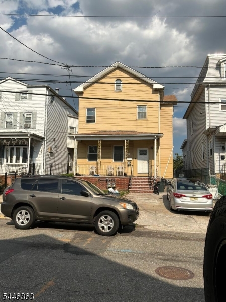 Conveniently, located 2 units w/finished attic, parking for 3 cars. 1st floor, 2-bedrooms, living room, eat-in kitchen, bathroom vacant needs work. 2nd floor,2-bedrooms, eat-in kitchen, bathroom, month to month, rent $1,450.00. Attic, 1-room with full bathroom, full unfinished basement w/ utility room, laundry hook ups.Ceramic and laminated floors, separate utilities. To be sold in as is condition buyer responsible for all city inspections and repairs. Home does not qualify for regular funding, due to its condition all offers in writing to be presented large shed in the long backyard.