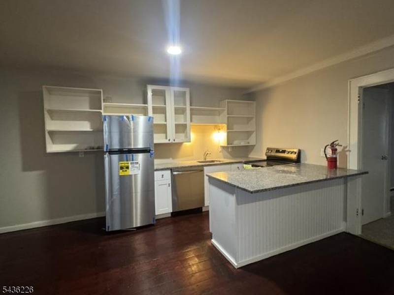 NEWLY RENOVATED! Be the first to live in this bright and modern 2BR/1BA apartment in the heart of Downtown Sussex. Features include a brand-new eat-in kitchen with exposed brick, granite countertops, new cabinets, and all-new appliances, plus a refreshed full bath, spacious living room, washer/dryer hookups, and abundant natural light. Enjoy your own private rooftop deck, with convenient on-street and municipal parking nearby. Walk to shops, restaurants, and local businesses. Move-in ready!Mixed-use building also available for sale (MLS #3977208), including retail space, apartment, and basement.