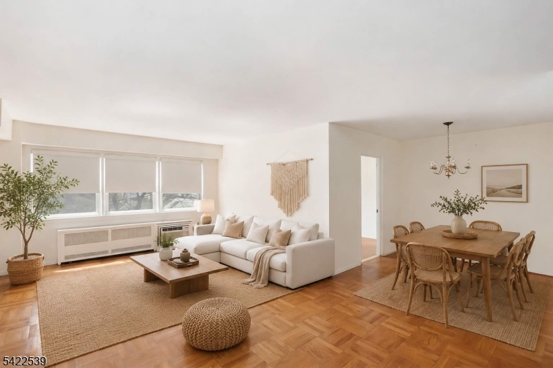 Beautifully maintained condo in the heart of Montclair, just moments from downtown and just over 1 mile to the train. Inside, wood floors flow seamlessly throughout, leading to an oversized living room with plenty of space to relax or entertain. A defined dining area connects easily to the upgraded kitchen, featuring stone countertops, rich cherry cabinetry, stainless steel appliances, and exceptional storage. Both bedrooms are generously sized with ample closet space throughout. Additional highlights include a heated garage with assigned parking space, elevator building convenience, and a bus stop right across the street for easy commuting. Monthly maintenance includes heat, water, and sewer. Pet-friendly complex with additional storage and laundry located in the basement. All just minutes to shops, restaurants, and NYC transportation.