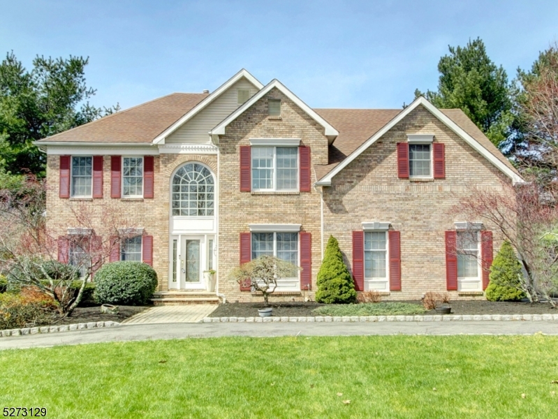 Stunning Toll Brothers Colonial is situated on a beautifully landscaped 1+ acre lot across from farmland. Enjoy your backyard as extended living space. Entertain and vacation at home. Gorgeous in-ground pool with new pump and new heater, hot tub and large deck with gazebo (included). This beauty features 4 bedrooms, 2 Full and 2 half baths. As you enter the home you will be impressed by the two story foyer, gorgeous updated kitchen, desirable two story family room with newer flooring, skylights, gas fireplace & second staircase to second floor. First floor office is certainly a big plus, and formal living & dining rooms are perfect for entertaining. Powder room has been remodeled. Expect to be impressed by the huge primary suite with newly remodeled master bathroom with free-standing soaking tub, walk-in shower with river rock floor, barn wood style floor tile & sliding barn doors. The large walk in closet is also a delight. Three additional spacious bedrooms and main bath complete the second floor. The full-finished basement can be enjoyed by all. It features a half bathroom, wet bar and pool table which is included. Other special features include crown moldings, circular driveway, central vacuum system & new hot water tank.   Conveniently located near Routes 206 and 80. A must see!