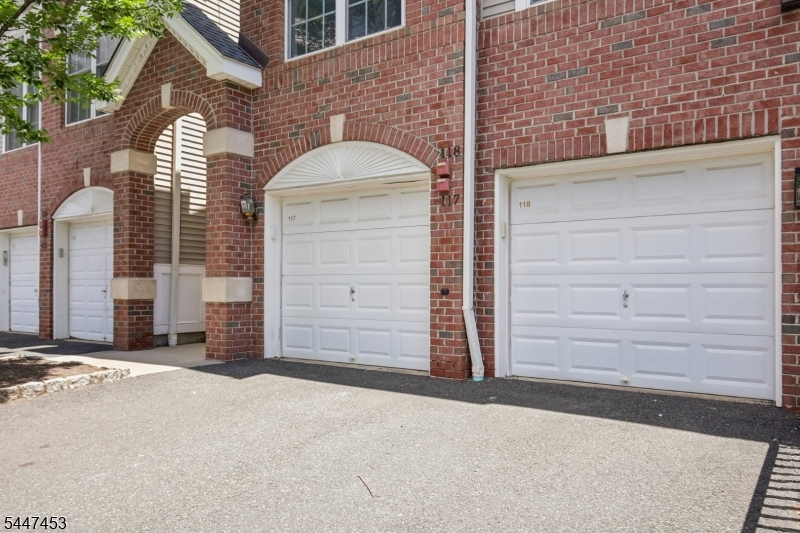 Beautifully updated and truly move-in ready, this elegant 2-bedroom, 2.5-bath townhome in The Reserve offers the perfect blend of style, comfort, and convenience. The open-concept floor plan is ideal for both everyday living and entertaining, while the fully finished walkout basement expands the living space with a spacious great room and sliding doors leading to a private patio. The stunning kitchen features 42-inch cabinetry, granite countertops, and stainless steel appliances. Recessed lighting brightens both the main level and lower-level living areas, creating a warm and inviting atmosphere. Retreat to the luxurious primary suite, complete with an oversized walk-in closet and a spa-inspired en-suite bath featuring dual vanities, a separate shower, and a relaxing soaking tub. The hallway bathroom is fully renovated.  Additional highlights include 9-foot ceilings on the first floor, a balcony off the living room, abundant storage throughout, and a sophisticated three-zone HVAC system with dampers for enhanced comfort.Freshly painted and finished with gorgeous genuine white oak hardwood flooring throughout, this home is completely carpet-free, offering timeless elegance and easy maintenance. Ideally located close to shopping, dining, major highways, and everyday conveniences, this exceptional home truly has it all.