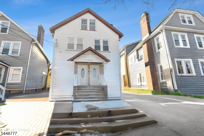 Beautifully maintained 2-family home in the highly sought-after Bloomfield, NJ neighborhood. Renovated in 2024, the property features new flooring, recessed lighting, updated kitchen, fresh interior paint, and renovated bathrooms. New Heating and water Boiler   This spacious home offers a total of 8 bedrooms, with 3 & 5 bedrooms in each main unit, making it an excellent opportunity for owner-occupants or investors seeking strong rental income potential. Each main unit includes a full bathroom, while the finished basement and finished attic each have their own full bathroom, providing exceptional flexibility for extended living, recreation, a home office, or additional living space (subject to local regulations).  Additional highlights include an oversized garage and a private driveway with rear access from the side street, offering ample off-street parking.  Conveniently located near major highways, public transportation, shopping, restaurants, parks, and schools, this property combines space, functionality, and an outstanding location. Don't miss this exceptional opportunity to own a versatile, income-producing property in one of Bloomfield's most desirable neighborhoods. Disclaimer: All photos are virtually staged and are for illustrative purposes only. They are intended to help visualize the property's potential and may not accurately represent the current condition or furnishings, Washer dryer included and sharing with both Floor