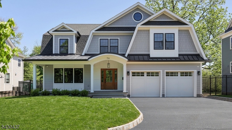This brand new Dutch Colonial features high end workmanship &modern layout. Located a short distance from the hustle-bustle of Westfield's downtown, schools, & train, this home is stunningly beautiful; the front porch is spacious & welcoming, the exterior is finished w/ ease of lifestyle in mind: composite siding/trim, metal roof accents, sodded front lawn, irrigation system, whole house generator hook up installed, EV charger. The deep lot allows for an extensive fully fenced back yard, the covered outdoor Mahogany deck offers the most ideal setting for enjoying outdoor dining & relaxing while overlooking the large, private backyard space. Inside, natural light floods each room, highlighting the white oak floors, custom trim, paneling & finishes t/o the home. The open concept 1st level is ideal for daily life as well as entertainment; sophisticated touches t/o make every space a dream. The custom mudroom off the garage entry, the private 1st floor guest suite, the walk in pantry, the heavily windowed breakfast room overlooking the grounds: all yield sophisticated, elevated lifestyle. There is a RARE 5 bedroom 2nd floor layout w/ a primary suite that will please the most discerning buyers: dual walk in closets, dual vanities, oversized shower, gorgeous soaking tub, & private water closet. The 3rd level bonus space coupled w/ the lower level custom bar, theater/gym room, bonus room w egress window completes this superb new build. This is not just a home. This is a lifestyle.