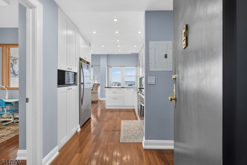 Wake up to the Hudson River and the Manhattan skyline from this bright 23rd-floor residence in The Versailles, one of Boulevard East's most established riverfront co-ops. Spanning 960 square feet, this tastefully updated and thoughtfully laid-out home lives as a flexible two-bedroom, with one room currently converted for use as a second bedroom or home office, plus a full bath and a private balcony where the view becomes part of your daily routine. Perched above the river, The Versailles has long been a favorite for commuters and skyline lovers alike with it's sweeping, unobstructive views of the city and Hudson River: it's just 20 minutes to Manhattan by bus or ferry, making the city feel close without giving up the calm of riverside living. The full-service building offers 24-hour doorman and security, an on-site fitness center, a resident lounge, laundry facilities, mail storage, and elevator access along with the kind of amenities that turn a building into a lifestyle: a rooftop pool with a lounge and patio deck, a riverside promenade with BBQ grills for warm-weather evenings, and private underground parking, a rare find this close to the water. Whether you're commuting into the city or unwinding above it, Apt 23J offers a rare combination of space, views, and convenience in one of the Hudson waterfront's most recognizable addresses.