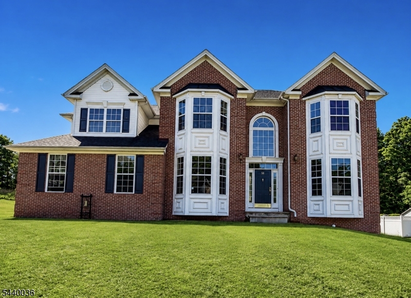 Welcome to this beautiful 4-bedroom, 3.5-bath Colonial located in one of the area's most desirable neighborhoods. A dramatic two-story foyer welcomes you into this spacious home featuring a formal living room, formal dining room, private office/den, and a stunning two-story family room with abundant natural light and a gas fireplace.The gourmet kitchen offers granite countertops, stainless steel appliances, a center island, pantry, porcelain tile flooring, and a bright breakfast area. A butler's pantry connects the kitchen and dining room, making entertaining easy. Sliders from the sunroom lead to a level backyard. The main level also includes a powder room and laundry room. A dual staircase leads to the second floor, where you'll find an open landing overlooking the foyer and family room. The primary suite features a sitting area, walk-in closet, and private bath with a jetted tub and shower. 3 additional bedrooms and a full main bath complete the second level. The partially finished basement with a full bathroom includes space for a recreation room, exercise area, TV/lounge area, and kitchen/bar area, This versatile lower level offers an excellent opportunity for the next owner to customize and complete to their own taste and lifestyle. Additional highlights include a newer roof, public utilities, and a convenient location close to schools, shopping, dining, and major highways. Professional Pictures by 6/21.