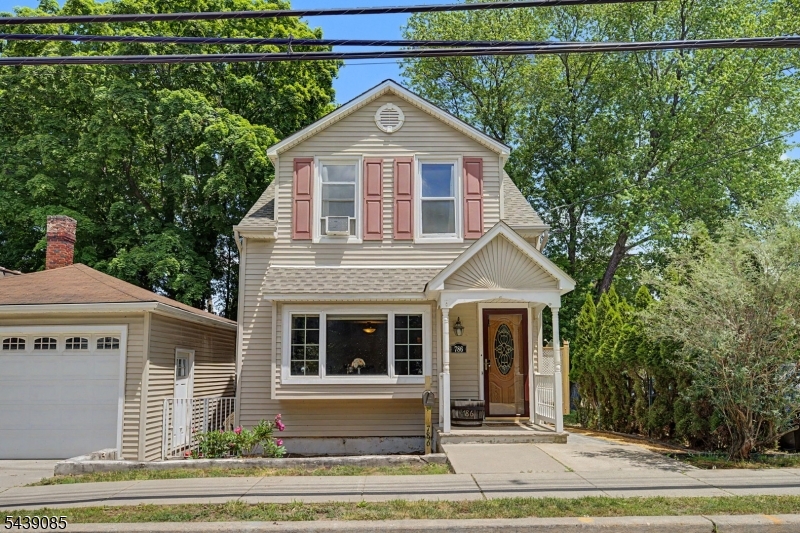Welcome to 788 Belmont Avenue, a charming colonial-style home with a 2-car garage situated on a double-lot. The first floor features a spacious living room with a gas fireplace and dining area, a large eat-in kitchen with wooden cabinets, stainless steel appliances, and a door to the deck that walks out to the backyard, and a renovated full bathroom. All four bedrooms are on the second floor, and the walkout basement that has laundry and utilities. The backyard provides a large outdoor space with a patio that is great for entertaining. This home is well maintained with a new roof installed in 2023, conveniently close to schools and restaurants, and is turnkey ready for its new owners!