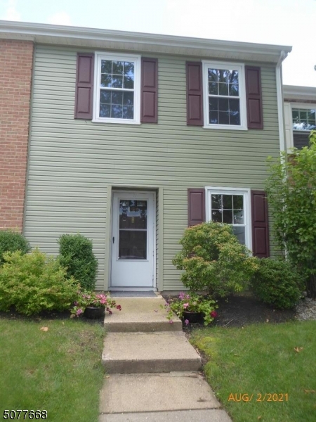 Desirable Deer Run Community.  Two bedroom townhouse with each bedroom having its own bathroom.   Large closets and laundry on second floor. Sliders on first floor open to private deck with storage and large grass area.  This community offers golf, tennis, pool and clubhouse.  Minutes from Route 80, 23 and 46. Seller is motivated, present all offers!