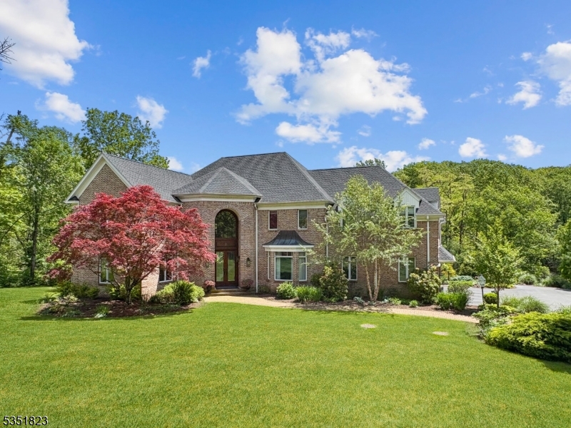 This exceptional custom home is nestled in a retreat-like setting on a cul-de-sac road in one of Chester's most desirable neighborhood. The home is generously-scaled with a floor plan that is comfortable for daily living with indoor and outdoor spaces that are perfect for entertaining throughout the year. Light-filled rooms benefit from oversized windows offering gorgeous views from every window and remarkable pond views from many areas of the home. The large kitchen with its generous center island and adjacent eat-in area connects to a large, updated deck running the entire length of the house. Second floor features 4 bedrooms and a bonus office/bedroom/rec room space. Additional recent upgrades include new roof in 2024, primary bedroom bathroom and closets, 2nd floor laundry room expansion, updates to finished walkout basement and its full bathroom, the addition of a kitchen pantry, new hardwood floors and carpeting on the second floor, interior paint, new HVAC, and finished garage with new garage doors. Idyllic backyard defined by perimeter fencing includes custom heated pool with waterfall and WiFi control system, raised bed garden, large lawn area, and mature flowering trees and perennial gardens with state-of-the-art sprinkler and lighting system.  Indoor inwall and outdoor speaker system. Convenient to public and private schools, recreation areas, shopping, and commuter highways