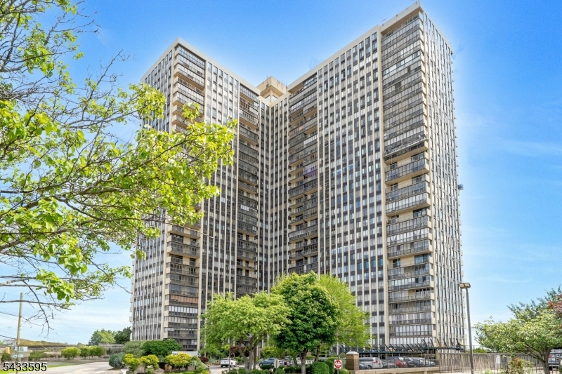 Desirable 1-bedroom, 1-bathroom high-rise condominium situated in the prestigious Winston Towers complex of Cliffside Park. Spanning approximately 962 square feet, this spacious single-level residence features a functional open-concept layout that includes a bright living room, formal dining area, and a fully equipped kitchen. The living space transitions to a large, east-facing balcony that provides functional outdoor space. Modern amenities include efficient heat pump heating, wall-unit cooling, and the convenience of an in-unit laundry area. Residents gain access to premium community features, including 24-hour security, a doorman, elevators, an exercise room, an outdoor pool, and tennis courts. Monthly association fees cover common area maintenance, amenities, and garbage removal. Located near shopping, local parks, and major transportation routes for an effortless commute.