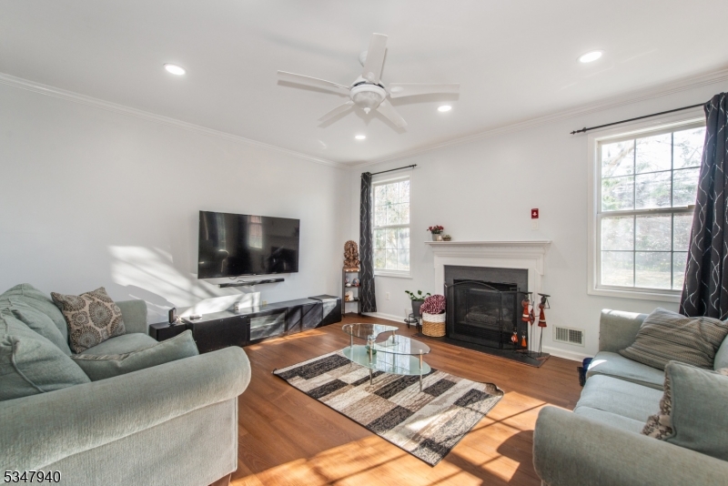 Gorgeous multi-level townhome in Cambridge Crossings. Sussex model - the largest floor plan offered! Ground level entry, open floor plan, walk-out to patio, luxurious master suite, multiple walk-in closets, granite kitchen, fireplace, and much more! This gated community features a pool, clubhouse, exercise room and saunas. Clifton Train Station and NYC bus are less than a mile away!