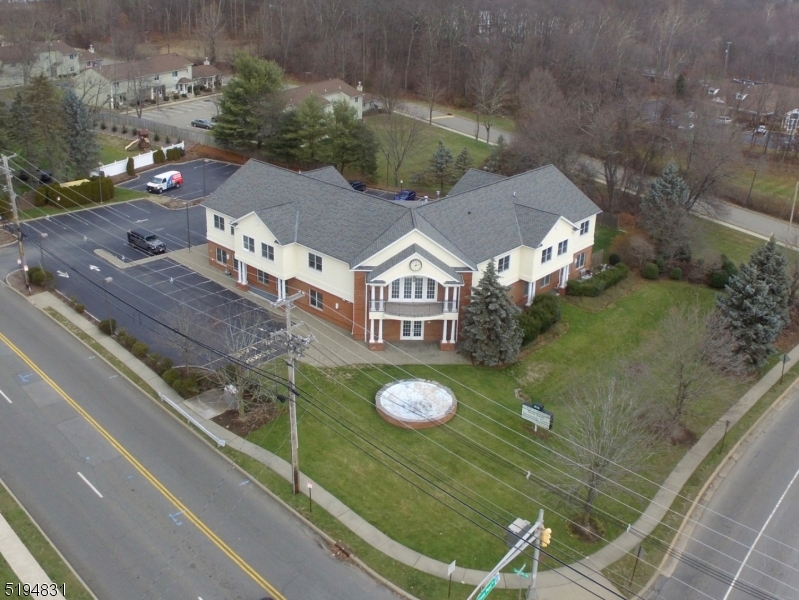 SPACIOUS 12,000+ SQUARE FOOT COMMERCIAL BUILDING WITH AN ADDITIONAL FINISHED BASEMENT WITH HIGH VISIBILITY.  THIS BUILDING IS IN EXCEPTIONAL CONDITION AND HAS PARKING FOR ABOUT 40 VEHICLES. A MUST SEE!