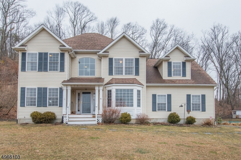 Look no further! This Gorgeous 4 bedroom, 2.5 bath Colonial has it all! Many updates w/ finished basement and in-ground pool. Private level lot at the end of cul-de-sac w/ stunning mountain views. Beautiful hardwood floors throughout, freshly painted w/ neutral colors, large windows w/ tons of natural light, Large Eat-in Kitchen open to Living Room w/ cozy wood burning fireplace, formal dining room for holiday gatherings and extra den finish the first floor. Retreat to the Master Bedroom w/ walk-in closet. Master Bath features double vanity, soaking tub, stand up shower. All 3 remaining bedrooms have ample natural light and large closets for lots of storage. Full finished basement with rec room. Enjoy the private backyard oasis on the newer multi-level deck, keyhole in-ground pool, backs to apple orchard.
