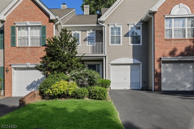 This luxury townhome features an open floor plan, dramatic 2-story living room with gas fireplace, wall of windows, and rich hardwood floors. The chef's kitchen offers custom wood cabinetry, granite counters, marble backsplash, and stainless steel KitchenAid appliances, opening to a formal dining room with beautiful custom millwork. The primary suite includes plantation shutters, accent wall molding, walk-in closet, dual-sink vanity, seamless glass shower, and soaking tub. Fireplace, flue, chimney, and ceiling fan are conveyed in "as is  condition with no known issues.  Photos reflect previous staging.  House also listed for rent #4012668