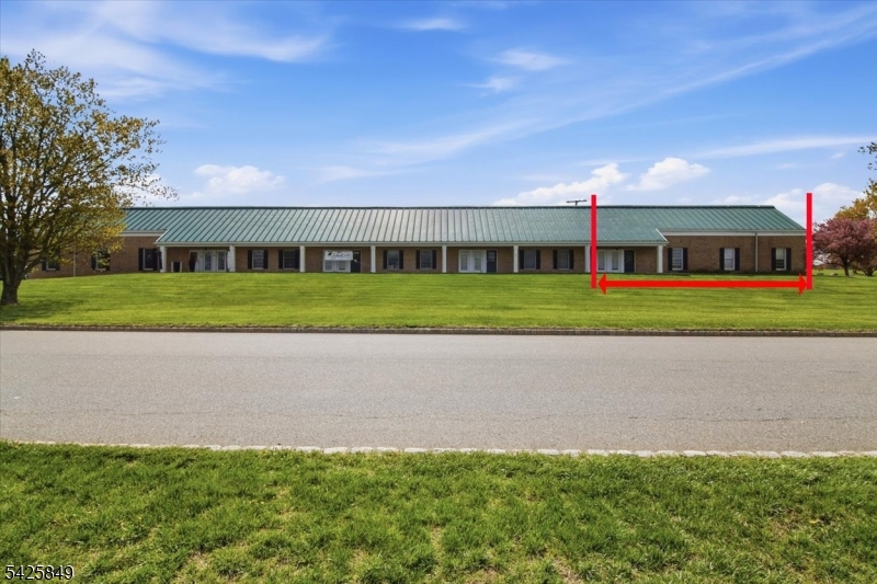 Flexible Warehouse/Office Space For Sale  3,276SF Well-positioned and highly functional, this  3,276 SF industrial unit offers a versatile layout ideal for a wide range of business uses. The space features a wide-open warehouse with approximately 18' ceiling height, providing excellent vertical capacity for storage, equipment, or operational needs. A 14'w x 12' high drive-in door allows for convenient loading and efficient access for vans, trucks, and equipment. This end unit includes three private office spaces, a restroom, and a small kitchenette, creating a balanced environment for both administrative and warehouse operations. An additional loft area provides valuable bonus storage, maximizing usable space. Located within a larger industrial complex, this unit is separately deeded and individually owned, offering flexibility and long-term value. The property is part of an association that handles common area maintenance, contributing to a well-maintained and professionally managed setting. Parking is available on-site. Space will be delivered vacant. Buyer has the option to keep shelving or seller will remove it.