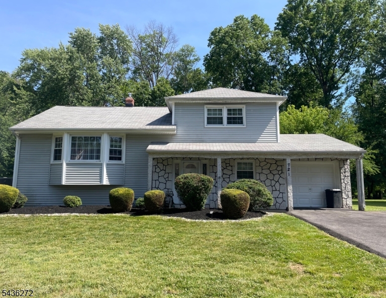 Welcome to this beautifully updated 4-bedroom Sugar Maple Split-Level in the heart of North Plainfield. Freshly painted and well maintained, it blends modern upgrades with comfortable living.The ground level features a fully renovated kitchen with new cabinetry, opening to a spacious family room, dining room, and powder room with hardwood floors. A flexible bedroom on this level works perfectly as a home office. New sliding doors lead to a paved backyard patio with a storage shed.The second level offers an elevated, open-plan living room filled with natural light. Upstairs, the primary bedroom includes a private half bath, along with two additional bedrooms and a full bathroom. Major updates include a new furnace and hot water heater. A finished partial basement adds storage and a dedicated laundry area, and the long paved driveway provides parking for three cars.Located in a prime Somerset County neighborhood, this home offers quick access to Green Brook Park, Bridgewater Commons, and major routes 22, 78, and 287, plus convenient public transit to NYC. Enjoy modern living with quality finishes and small-town charm. House being sold as-is. Schedule your private tour today!