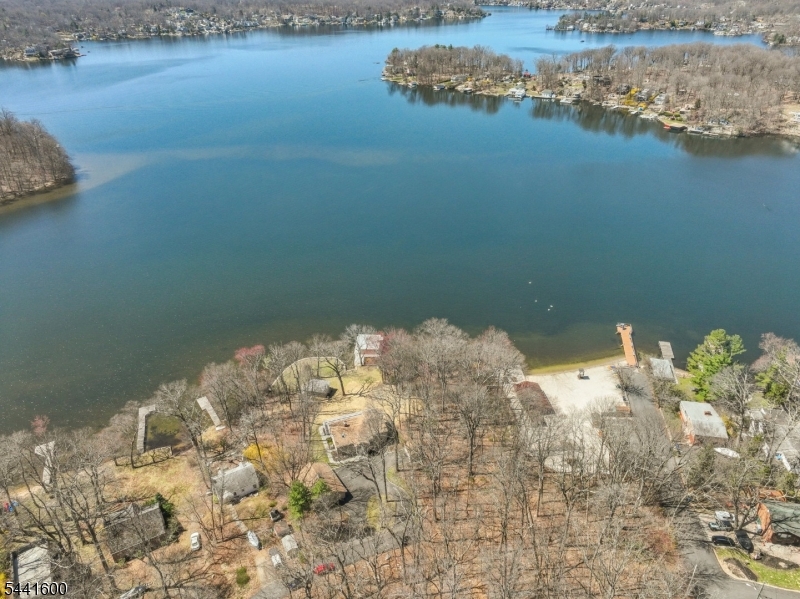 Discover a rare and remarkable opportunity to own a raw, level lakefront parcel on Lake Hopatcong, New Jersey?s largest and most iconic lake. Set on an expansive .65-acre lot with approximately 100 feet of prime lake frontage, this exceptional property offers the perfect canvas to design and build your custom dream home. Enjoy breathtaking sunsets, effortless lake access, and endless opportunities to swim, boat, fish, and entertain?all from your own backyard. Properties of this size, topography, and direct waterfront presence are increasingly hard to find, making this an extraordinary chance to create your own private retreat and truly live the vacation lifestyle every day.