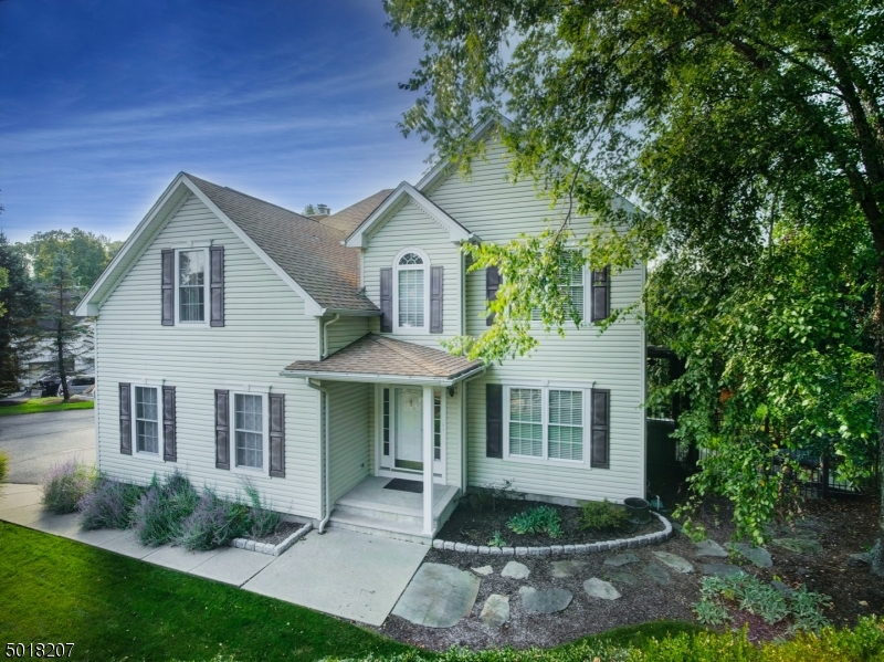 THIS BYRAM BEAUTY IS SITUATED ON A BEAUTIFUL, PRIVATE & FENCED LOT SURROUNDED BY TREES & A GORGEOUS LANDSCAPE INCLUDING KOI POND WITH WATERFALL & STONE STEPS TO LEVEL YARD WITH 2 PATIOS & PAVER WALKWAYS THIS WELL MAINTAINED HOME IS LOCATED IN A DESIRABLE NEIGHBORHOOD & FEATURES A 2 STORY FOYER, FORMAL LIVING RM & DINING RM, SPACIOUS BDRMS INCLUDING MASTER SUITE W UPDATED BATH & WALK IN CLOSET - FINISHED BASEMENT MAKES THE PERFECT REC RM W DRY BAR, S/S FRIDGE, AREA FOR HOME OFFICE & PLENTY OF STORAGE- FAM  RM HAS FP, WOOD FLOORING & LARGE WINDOWS W PEACEFUL VIEWS. KITCHEN HAS SEP 2 STORY DINING AREA & LEADS TO DECK OVERLOOKING THE BEAUTIFUL TREE LINED YARD. OTHER FEATURES INCLUDE SUPER CONVENIENT 2ND FLR LAUNDRY, CUSTOM WOODWORK, WOOD FLOORS & CALIFORNIA STYLE CLOSET SYSTEMS- 1 YR HOME WARRANTY INCLUDED