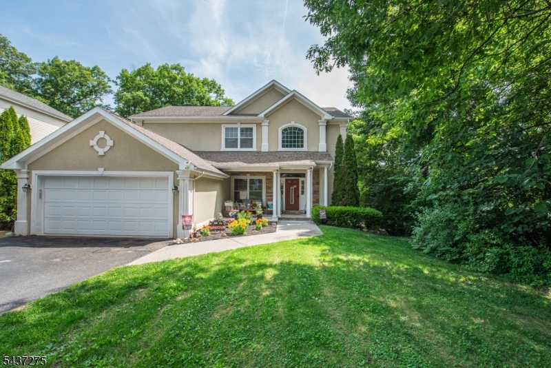 Welcome Home! This beautiful 5 bedroom, 3.5 bathroom colonial on a quiet cul-de-sac offers a wonderful floor plan.  Walk into a gorgeous foyer with dining room, kitchen, breakfast nook and living room.  Enjoy your coffee in the living room next to the two sided fireplace or on the deck right off of breakfast nook. The second floor has 4 bedrooms, full bathroom and primary bedroom with walk in closet and private bathroom with bathtub and separate shower.  The walkout ground level is the perfect in-law suite, complete with living room, dining area, kitchen, bedroom, full bathroom and plenty of storage.  Access the above-ground pool from the main level deck or right from the walkout ground level.  This home has everything you need.  Close to Routes 23 and 287, stores and many restaurants! House sold strictly AS-IS.