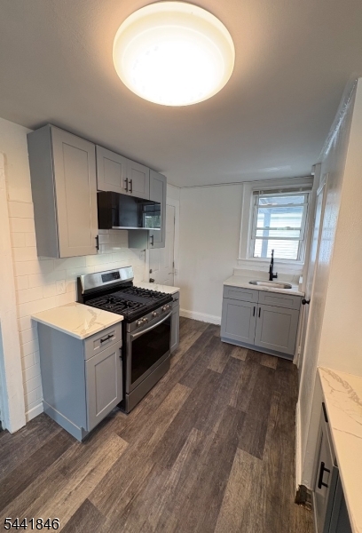 Beautifully renovated 3-bedroom, 1.5-bath home! The expanded kitchen features new flooring, cabinets, quartz countertops, and stainless appliances. There's a fully updated bathroom with new tub and vanity, plus fresh paint throughout. New LED lighting in all rooms. Enjoy your private balcony off the brand-new Trex deck. Laundry and storage in basement, plus off-street parking in a large driveway. Just a 10-minute walk to NJ Transit station and 1 mile from Seton Hall University. Move-in ready, available July 1.