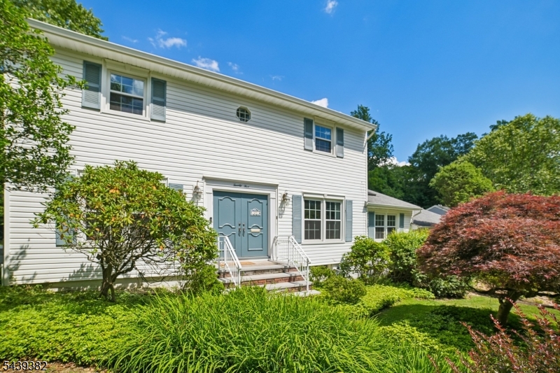 SPACIOUS COLONIAL with 2 SIGNIFICANT ADDITIONS and recent renovations of newer kitchen, 3 full bathrooms.  Sets on .3 acre on BROADLAWN most desirable street. 2800 sqft easy flow living not including finished basement. Formal Living, open concept dining room and newer kitchen,  High ceiling cozy Family Room w/wood burning fireplace, built-ins & french doors to oversized deck overlooking private level yard. Addition incl. 1st floor 300 sf den / guest Ste w/full bath. Upstairs 400 SQFTmaster suite, 2nd master ste. Original Master BR with newly renovated en-suite morden bath plus a 3rd BR with full newly renovated bath in hallway. Kitchen Pantry and  laudry room right off the kitchen, w/2-Car Garage access on the same level.  Finished basement with rec room. 10 min to NYC bus and Mt Pleasant schools. Well maintained home with whole house generater, Central AC and 2 split AC units.