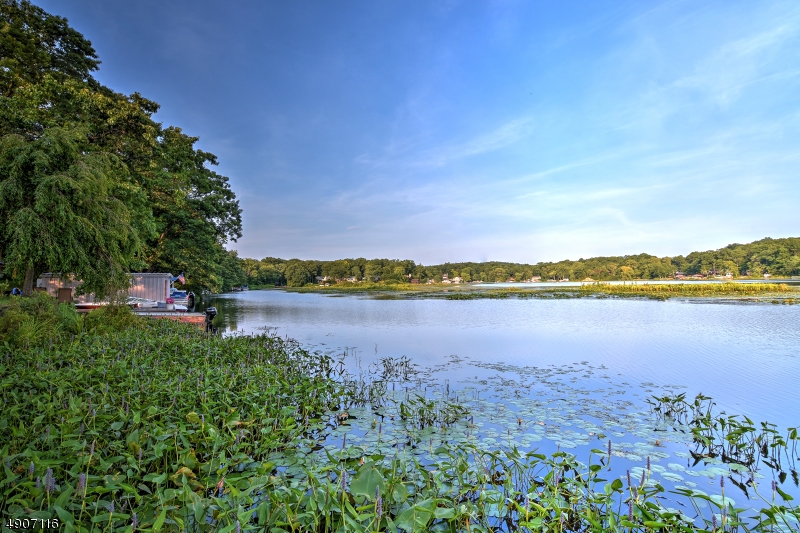 Charming 2 bedroom/1bath lake style home located in Cranberry Lake with direct access to the lake. Enjoy lake life with a your very own personal dock on the water, perfect for water toys. Take a dip in the lake and then walk home to relax while overlooking your yard from bay windows. Lots of storage in the yard with 2 sheds. High ceilings give the eat in kitchen a feeling of depth and space. Well installed in 2009 and a newer roof. Just waiting for a new owner to make it their own perfect retreat. Sq. Feet from http://www.njactb.org/.