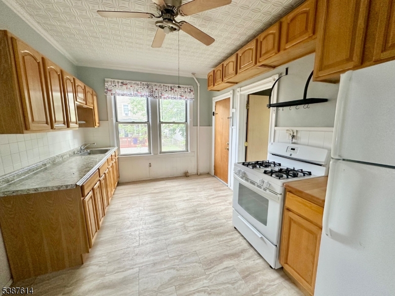 Renovated 1st floor, 1-bedroom apartment with an eat-in kitchen and an abundance of cabinet space. Large sun-filled living/dining room. large private backyard. Full height large basement with private storage locker. Washer & Dryer in the basement. Easy highway access and downtown Main Street shopping and dining. The apartment is currently occupied.