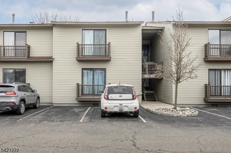 Spruce Hills premieres this lovely 2 Bed 1.5 Bath second floor unit with Master Suite, ready and waiting for you! Well maintained in a sought after community with plenty of amenities to indulge,  just pack your bags and move right in. Step in to find a spacious, light and bright living room and dining room with laminate floors that shine and tons of natural light all through. The living room is adorned with a soaring skylight, cozy wood burning fireplace, and tinted slider to your own private deck, perfect for enjoying your morning coffee. Down the hall, find the convenient 1/2 bath, along with 2 generous bedrooms with plush carpets and ample closets, inc the Master Suite. MBR boasts its own walk-in closet, balcony and access to the main full bath. In-unit laundry adds to the convenience of this charming home. Central air/forced heat, ample on-site parking, and amenities to enjoy such as the outdoor pool, dog run, and multi-use sports courts. All in a convenient commuter location near shopping, dining, major roads and more. This is the perfect starter home. Don't miss out! Come and see TODAY!!