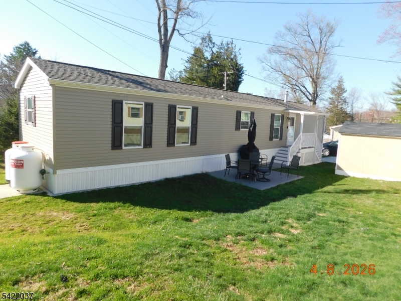 Wow! Large 2 year old manufactured home in move in condition. Original owner in this non-smoker home situated in Highlander Hills Estates.Home features 2" x 6" exterior walls , thermopane windows , vinyl siding,concrete driveway with all appliances. Great modern floor plan with each bedroom and bath at opposite ends of the home.Primary bedroom has walk-in closet.Leased land 55+ community. New 8 x 10 shed and patio.Leased land financing available to qualified buyers.