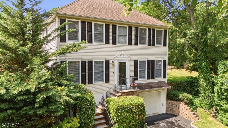 Welcome to 169 Broad Street, a beautifully maintained colonial ideally located in Summit's highly sought-after Brayton School district. Built in 2003, this spacious home offers the perfect blend of modern convenience and timeless design. The thoughtfully designed floor plan features generous living and entertaining spaces, a bright and functional kitchen, and a seamless flow for everyday living. Upstairs, you will find four well-proportioned bedrooms, including a spacious primary suite. The finished lower level provides valuable additional living space, ideal for a recreation room, home office, gym or playroom. Outside, enjoy a private backyard and easy access to everything Summit has to offer. Conveniently located near schools, downtown Summit, parks, shopping and transportation, this home offers the opportunity to enjoy one of Summit's most desirable neighborhoods and communities. A rare opportunity to own a newer colonial home in a prime Summit location.