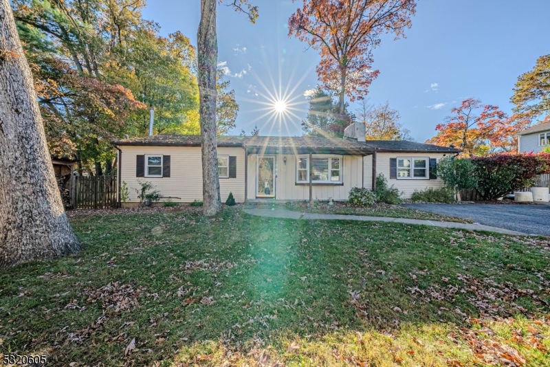Welcome to this charming ranch-style home situated on a .24-acre lot, offering a perfect blend of comfort and convenience. This 4-bedroom, 2 full bath residence is ideal for those seeking single-level living with ample space for everyone. Step inside to find a spacious formal living room featuring a cozy fireplace, perfect for warming up on chilly nights. The adjoining formal dining room is an ideal spot for hosting dinners or entertaining guests. The kitchen is well-appointed, with easy access to the screened-in porch, a perfect place to enjoy your morning coffee or unwind after a long day. Off the porch, you'll find a deck with a hot tub, offering a private oasis for relaxation. The full basement provides endless possibilities, with a partially finished area that includes a wood stove, adding additional warmth and charm. This versatile space can be transformed into a family room, game room, or home office, while still providing plenty of storage. For added peace of mind, the home is equipped with a generator transfer switch on the electrical panel, ensuring you're prepared for any unexpected power outages. This home is an excellent opportunity for those looking to enjoy the simplicity of ranch living while having modern amenities and outdoor space to entertain and relax. Don't miss out on making this your new home! As per the town this property has a 3 bedroom septic system.