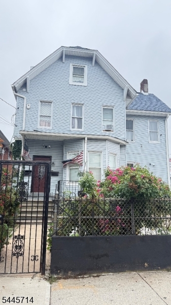 Two family house, three floors plus basement, finished attic with three bedrooms and bathroom, huge lot, driveway for two cars, property needs love and care, seller is selling "as is", no repairs will be done.