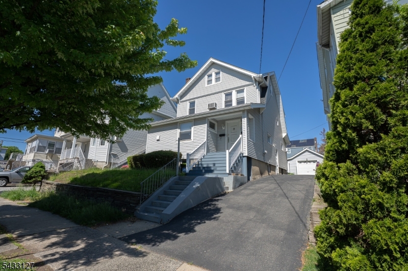 Well-maintained two-family home on desirable Kearny Ave featuring two 1-bedroom units and 3 full baths. Property includes a large attic with great potential for additional space, full basement for storage or recreation, and separate utilities. Conveniently located near schools, shopping, restaurants, parks, and public transportation with easy access to NYC. Excellent opportunity for investors or owner-occupants!