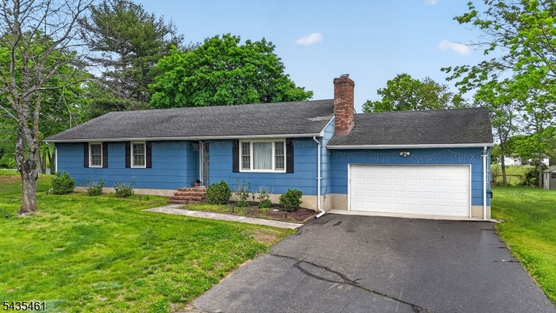 Welcome to Monroe Township! Nestled on an oversized 0.68-acre lot, this well-maintained 3-bedroom, 1 full and 1 half bath ranch-style home offers comfort, space, and endless potential. This home boasts an inviting eat-in kitchen, formal dining room, and a spacious living room highlighted by a classic brick wood-burning fireplace perfect for cozy evenings at home. Enjoy outdoor entertaining on the large rear deck conveniently located off the kitchen, overlooking the expansive backyard. The recently completed conversion from oil to natural gas adds modern efficiency and value. Additional features include hardwood flooring, wide hallways, central air, a full basement with inside and outside access, and an oversized 2-car garage. The impressive driveway offers parking for 2 cars wide and 3 cars deep, ideal for multiple vehicles, guests, or hobby enthusiasts. A rare opportunity to own a spacious property with room to grow!