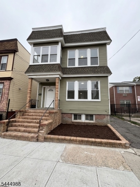 Turnkey income-producing 2-family home featuring two tenant-occupied 3-bedroom, 1-bath units, offering immediate rental income from day one. A great opportunity for investors seeking steady cash flow and long-term appreciation in Newark's strong rental market. Conveniently located near major highways, public transportation, shopping, schools, and local amenities, making it an attractive investment with consistent tenant demand.
