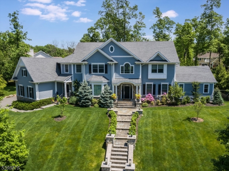 Experience the pinnacle of luxury living in this stunning center hall colonial, nestled on .63 acres.Boasting six generously sized bedrooms & six and a half baths across three levels of curated living space, this grand residence is a true testament to unparalleled luxury.Seller improvements include addition featuring large home office w/ full bath, heated in-ground saltwater pool, custom wall coverings and lighting.The exquisite dining room boasts a wet bar complete with a wine fridge and display.White remarkable eat-in chef's kitchen with a coffered ceiling, high-end appliances, walk-in pantry & sliders off the breakfast area for access to the backyard oasis.The expansive family room, with a double-story ceiling, floor-to-ceiling windows & fireplace exudes magnificence. A convenient private first-floor guest room with en-suite can also double as pool cabana.Primary bedroom retreat with a generously sized walk-in closet & spa-like primary bath.Entertainment abounds in the expansive lower level, featuring a screening room, recreation area, billiard room with built-in bar & private guest quarters.Step outside to behold mature landscaping & stone patio with new retractable awning, a perfect setting for al fresco dining with the newly constructed outdoor kitchen equipped with a Blaze grill.Convenient 2nd floor laundry room and den, 3 car heated garage and whole house generator.All curtains and light fixtures will come with the house.