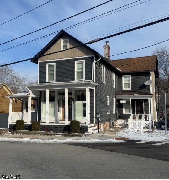 Introducing 44 Main Street a perfect blend of historic charm and modern adaptability! Originally built in 1885, this thoughtfully renovated Colonial combines classic architectural details with today's conveniences. Whether you're searching for a distinctive residence, planning to start a business, or exploring rental opportunities, this property delivers unmatched versatility.From the welcoming wrap-around porch to the eye-catching storefront windows and authentic craftsmanship, character shines throughout. Step inside to find polished hardwood floors, bold accent walls, and a gourmet kitchen featuring a Wolf gas range, granite counters, stainless steel appliances, subway tile back splash, farmhouse sink, and a Kitchen Aid refrigerator.Luxurious bathrooms showcase designer tile and high-end finishes, while a private suite with its own entrance offers the perfect setup for guests, a home office, or income potential. The fenced backyard is ideal for gatherings, and the septic system was inspected and approved in 2022 for added confidence. With dual residential and commercial zoning, this property sits just steps from the Califon bridge, charming local shops, and scenic surroundings. Located in a sought-after school district, it offers the ideal mix of country serenity and small-town convenience. Don't miss this exceptional chance to live, work, or invest in one of Hunterdon County's most picturesque communities!