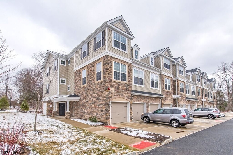 Beautiful bright airy 3 bed 2.5 bath end unit lg windows Modern Kitchen Granite counter pantry open floor plan Dining Rm Living Rm hardwood floor powder rm 3 lg br Master Br with walk in closet Attic Plenty of storage freshly painted 2 yr old carpeting Close to NYC trains major highways restaurants shopping etc.