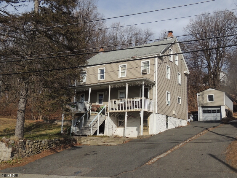 What a wonderful investment opportunity!!!   Great side by side duplex on a large lot is awaiting new owner!!   Number 87 offers spacious eat in kitchen, living room, two bedrooms, a bath, and family room/office on the third level.  Number 89 has large eat in kitchen, living room, bath, two bedrooms upstairs, the lower walk-out level provides family room, another bedroom and a full bath.  New heating system was installed in 2017. There is a detached garage with storage space above. All public utilities including gas, separate gas and electric meters. Hurry up!!