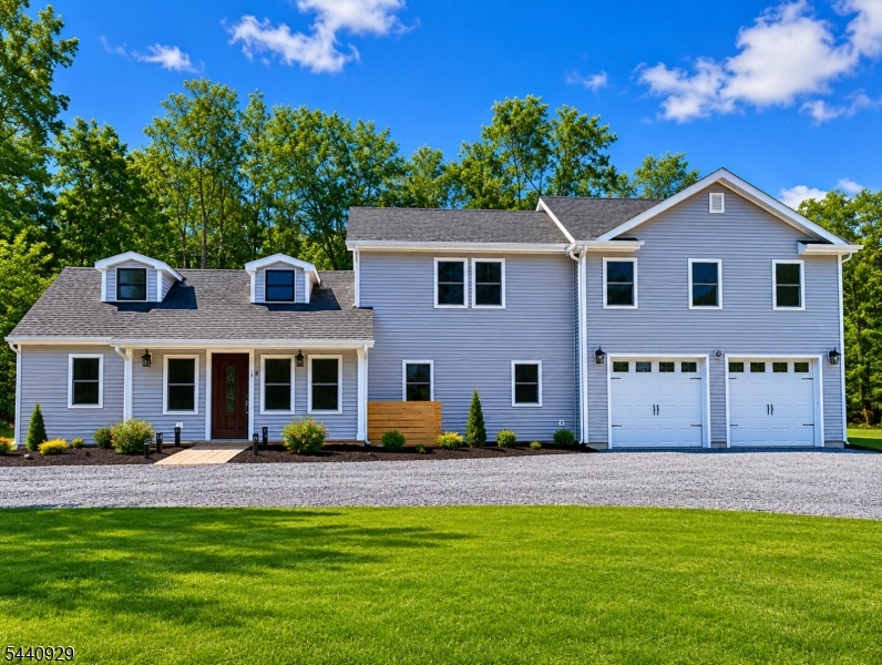 Location, Location, Location! Nestled on a private and picturesque one-acre lot in the heart of Hunterdon County, this beautifully renovated home offers the perfect blend of peaceful country living and everyday convenience. Enjoy privacy and tranquility while being less than two miles from shopping, dining, and major commuting routes to New York City. Designed with flexibility and comfort in mind, this spacious home features 3 bedrooms, 4 full bathrooms, two primary suites, a dedicated home office, and an additional flex room that can serve as a guest room, hobby space, or potential fourth sleeping area. The main level offers the convenience of a primary suite and an additional guest bedroom. The inviting kitchen boasts a dramatic cathedral ceiling, new stainless-steel appliances, marble countertops, and a bright eat-in area perfect for casual dining and entertaining. Generous living spaces throughout provide plenty of room for today's lifestyle needs, including remote work, hobbies, and entertaining. A rare opportunity to enjoy modern updates, versatile living space, and exceptional privacy in one of Hunterdon County's most desirable locations. Brand New Septic system is approved for 3 bedrooms.