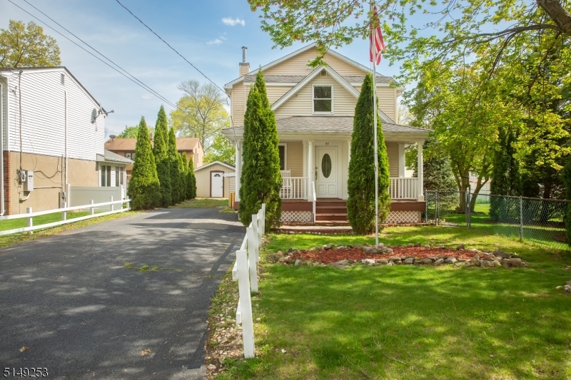Magnificently renovated custom colonial by Dominick Tedesco, on oversized lot!!  This impeccable home features large rooms, recessed lighting, hardwood and laminate flooring, a stunning kitchen and amenities galore!  The home's updates include: windows, exterior doors,  flooring, electric, vinyl siding,  Newer kitchen,  complete with a second floor addition. There is a shed plus work shop out back, plus plans for a deck. Walking distance to Lake. To show this home is definitely to show it.  Walking distance to lake.!!