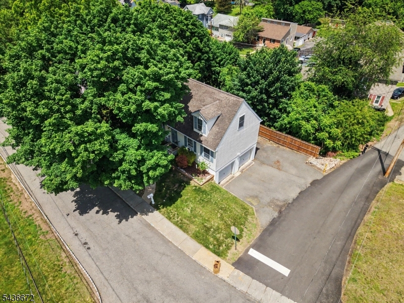 Well-maintained 4 bedroom, 2 bath Cape Cod situated on a corner lot in Wharton! The 1st FL feat. a living room, dining room, kitchen w/pantry, 2 bedrooms, & a full bath, while the 2nd FL offers two additional bedrooms & a 2nd full bath. The partially finished basement includes a family room, laundry area, utilities, & storage space. Additional features include hardwood floors, walk-in closets & linen closet, multi-zone heating, 2 car garage, & a full-house generator! Enjoy the private, fully fenced yard with paver patio space. Home is minutes from downtown & close to NYC transportation! ONE YEAR HOME WARRANTY INCLUDED!