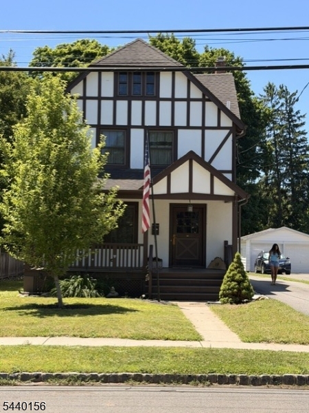 Recently updated 1930s colonial with lovely chestnut woodwork and a great floorplan. Hardwood floors and wood-look ceramic tile floor in the kitchen. Full front porch perfect for summertime sittin' and rockin' and greeting neighbors as they pass by. This excellent rental has lots of charm and charisma. Close (2 blocks) to the Morris Plains train station and very convenient to village shops and restaurants. Walk-up attic with lots of clean, well-lit storage space. Basement floor covered with resilient cushioned flooring ideal for a home gym, exercise or yoga. Substantial paved parking at the rear is easily adequate for several cars (the detached garage is not included with the rental).