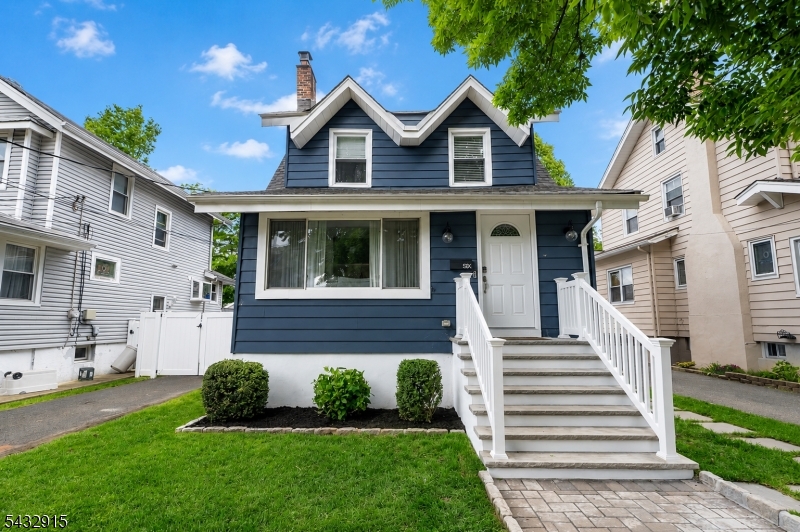 Nestled in a highly desirable section of Ridgefield Park, this completely renovated single-family home beautifully blends sophisticated updates with exceptional commuter convenience. The first floor boasts a seamless open-concept design, featuring a bright living space with a cozy wood-burning fireplace, a formal dining room that flows effortlessly into the kitchen, and a sleek powder room all opening up to a lovely back deck. Upstairs, you will find 3 bedrooms, a beautifully updated full bathroom, and access to a full attic for extra storage. No detail was overlooked in the extensive upgrades, which include brand-new hardwood floors and custom flooring throughout, central AC and heating, a fully finished basement, an electric vehicle charger, and a generous, fully fenced backyard complete with a lawn sprinkler system, a one-car garage, and an expanded driveway. Best of all, you are just a short walk from Main Street and the local bus stop for a direct commute into New York City. Must see!
