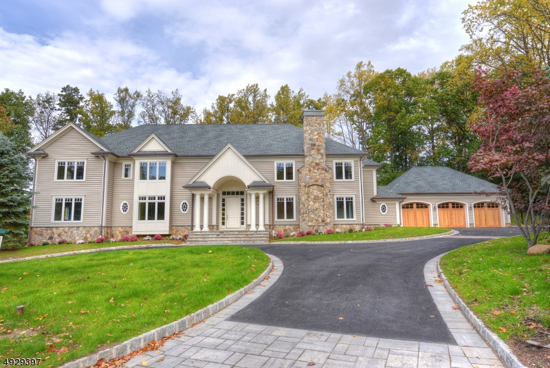Beautiful center hall manor. Don't miss this luxurious completely redesigned & renovated, five bedroom, six full and two-half bath center hall manor, finished in 2014. Absolutely the best location in Demarest. The home sits on 1.67 acres at the end of a cul-du-sac, backing up to Alpine Country Club's Golf Course. Gorgeous private property!  PRICED TO SELL!!