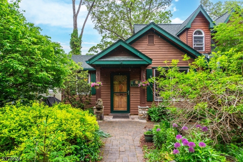 Please have offers in by 8/29 5pm in one PDF. Welcome to this wonderful custom home in the sought after Lake Telemark community. There is nothing cookie cutter about this place. Every nook and cranny shows craftmanship, love and functionality. First floor comprises a lovely living room with built-in cabinets and pellet stove, cozy dining room, galley kitchen with large pantry, office that could be converted to suit your needs, bedroom, oversized bathroom and light bright laundry room. The second floor offers additional beautiful bedroom with vaulted ceilings, skylights, tons of natural light and attic storage. As you move outside the back yard has 2 garden sheds, upper and lower decks, and a large patio creating the perfect space to unwind at the end of the day. The front is awash or flowering plants and bushes giving it the perfect English garden feel. As if that isn't enough, a brand new septic was installed in May, you are all set to charge your EV car, and new water filtration system has been installed to eliminate any PFOS. Don't miss out on the gem!!