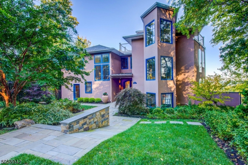 Reimagine your life style! Welcome to 160 Ocean Boulevard, Atlantic Highlands, NJ-offering the best of all worlds. A scenic seaside community with direct ferry access to New York City. Gracefully set atop the bluff overlooking Sandy Hook Bay, the Atlantic Ocean and the New York City skyline. This breathtaking home is renovated from top to bottom with no detail left untouched. Each room has spectacular views and abundant natural light streaming throughout the inviting floor plan. The heart of the home is the open concept chef's kitchen and family room. Flexible floor plan has plenty of room for working from home, working out, or tackling homework! Multi level decks with outdoor kitchen and hot tub. Al fresco living and entertainment at its finest!  Close to town and sandy NJ beaches.  Paradise Found!