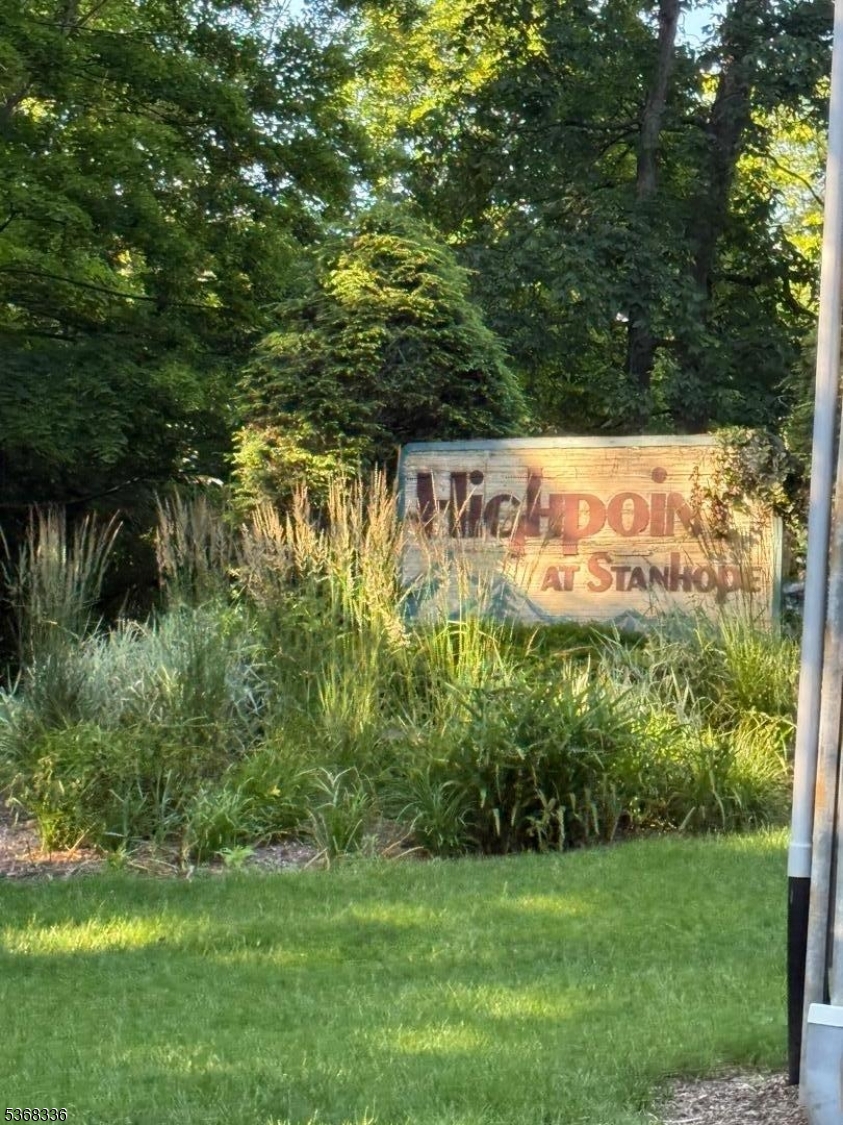 Great corner end unit ( 2 Floor)  w 2 bedrooms and 1.1 baths, features sliders to deck over looking the Dinning Room.  Bring your finishing touches. Home needs some TLC.  Association features a Club House, Pool. Minutes to Route 80, 46. Bonus storage on main level.